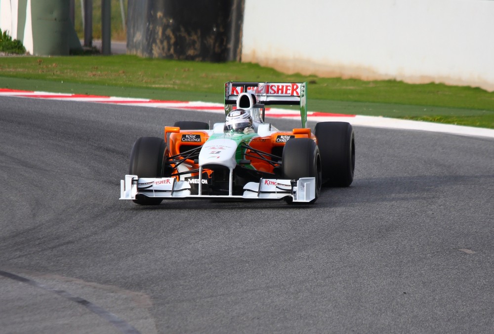 Kodėl F1 automobiliai bandymams nupurškiami žaliais dažais